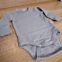 Body evolutivo grigio a costine a manica lunga
